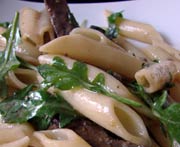 Penne con Prosciutto e Arugula
